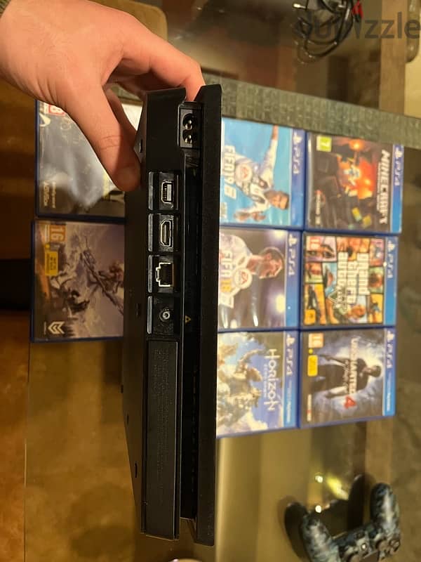 very clean ps4 with 8 games and a controller 3