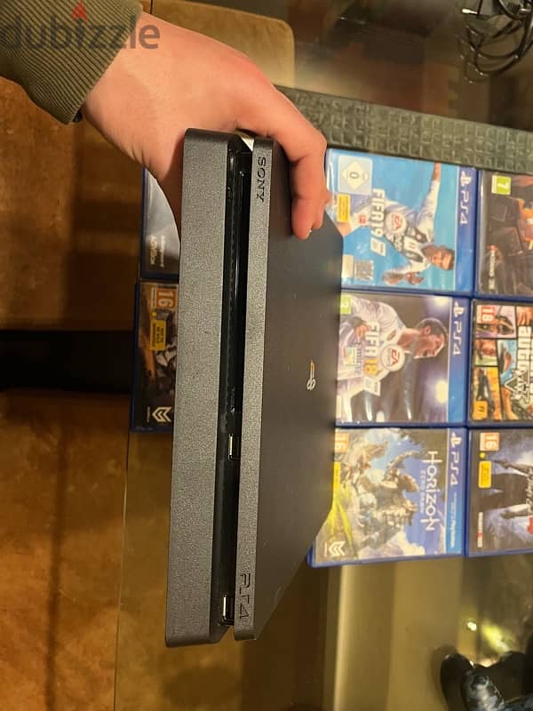 very clean ps4 with 8 games and a controller 4