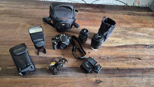 Nikon d5100 with 2 lenses and 1 flash