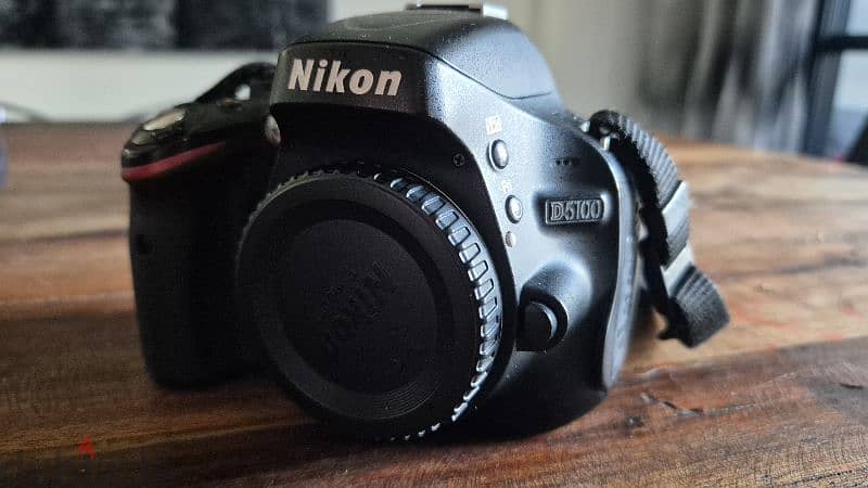 Nikon d5100 with 2 lenses and 1 flash 1