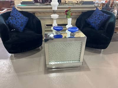 2 chairs with glass table