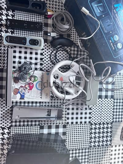 nitendo wii with 2 consoles steering wheel