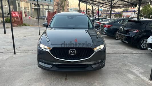 mazda cx5 touring AWD Clean carfax and law milg vin: JM3KFBCL8H0191923