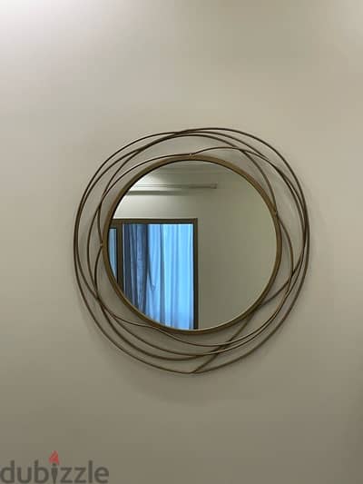 modern swirl round mirror