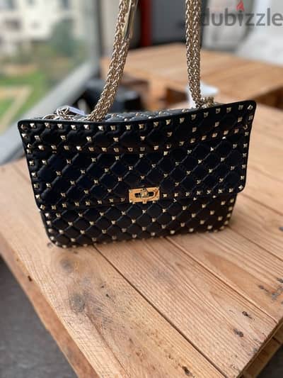 Valentino nappa rockstud spike black and gold bag