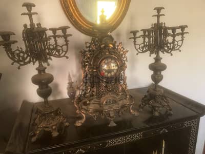 vintage brass clock and candle hangars