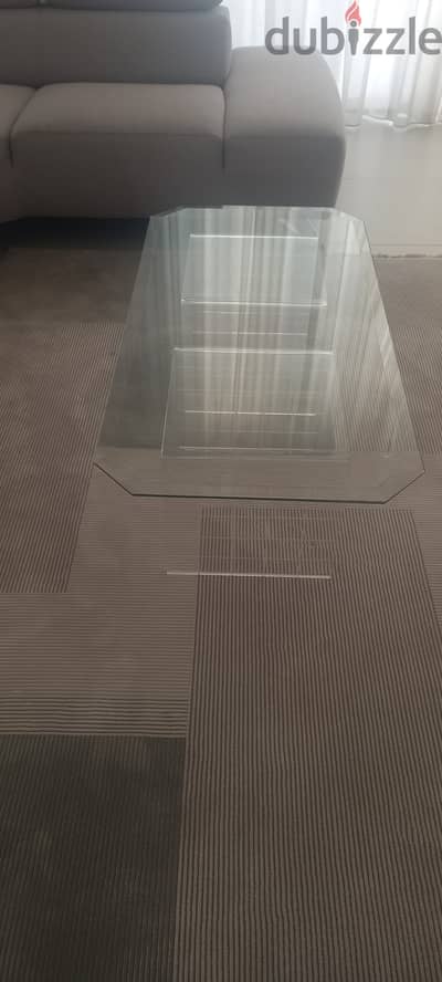 glass table with plexiglass support