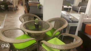 Razin table and four chairs set,