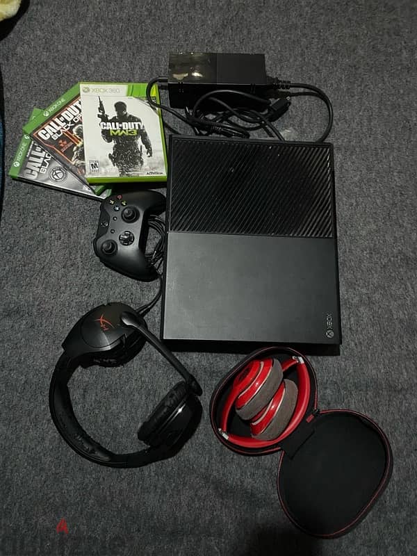 Xbox One Bundle with Controller, Headphones, and Games 1