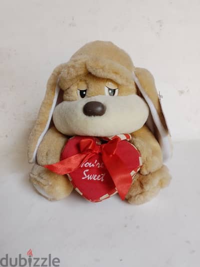 Dog plush with heart