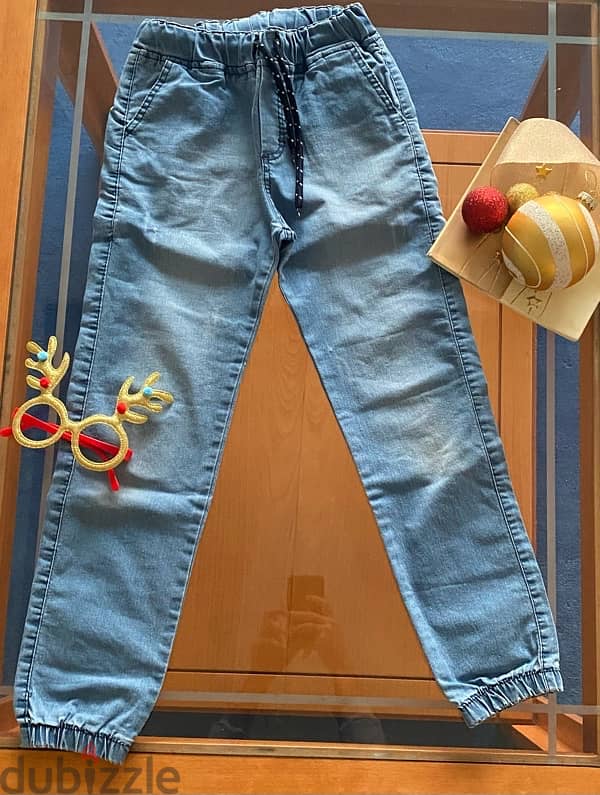 pair of jeans for girls, age 10 years 1