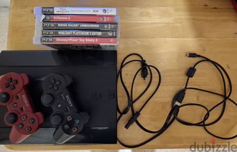 PS3 WITH 5 GAMES AND 2 CONTROLLERS