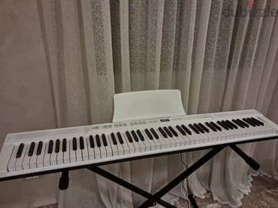 Electric piano 88 keys + stand and padel