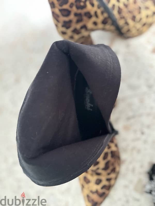 tiger boots/ verg good condition 6