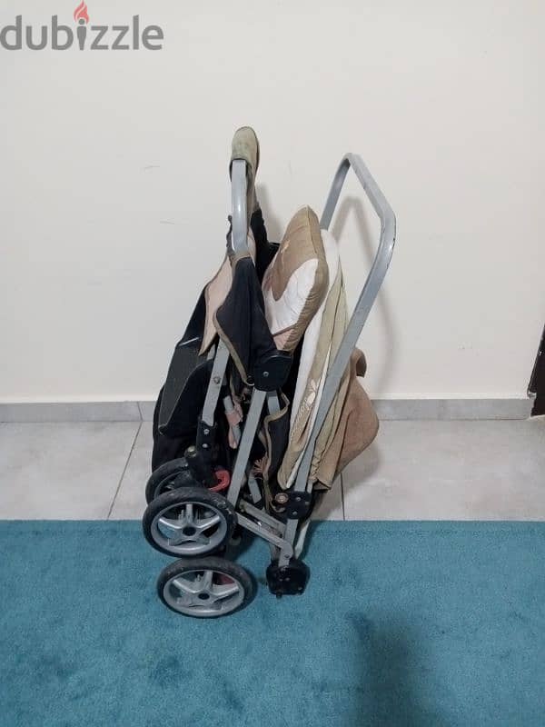 used like new strollers for two babies 7