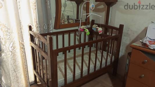 baby bed with mattress and sheet