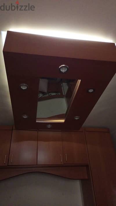 Lighting for bedroom ceiling with mirror.