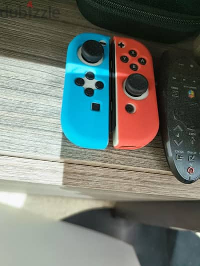 Nintendo Switch Oled with accessories and games