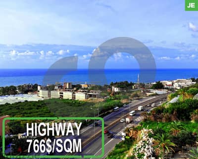 HIGHWAY LAND 1305 SQM IN AMCHIT- JBEIL/عمشيت REF#JE100372