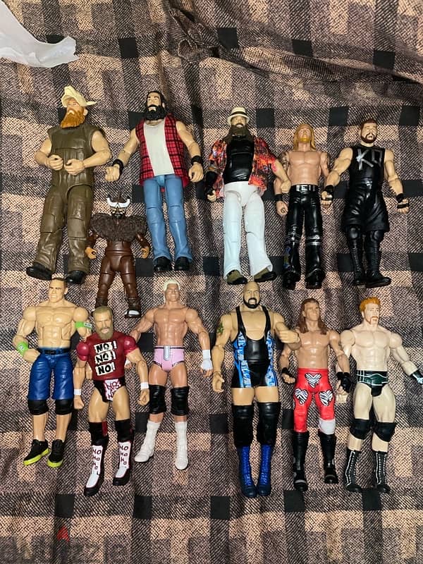 12 WWE wrestling action figures 0