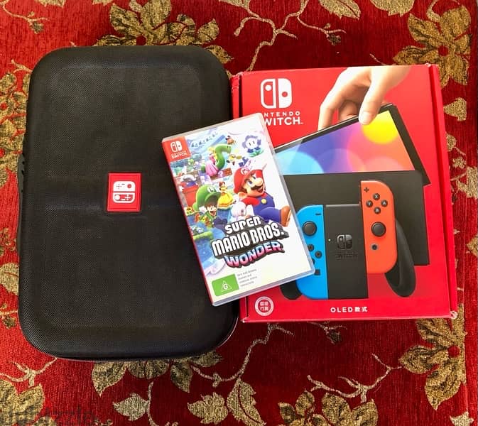 Nintendo Switch Oled + Bag + Game 2