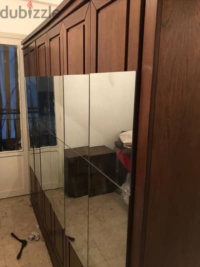 closet with mirrors