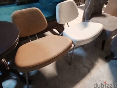 2 synthetic leather lounge chairs