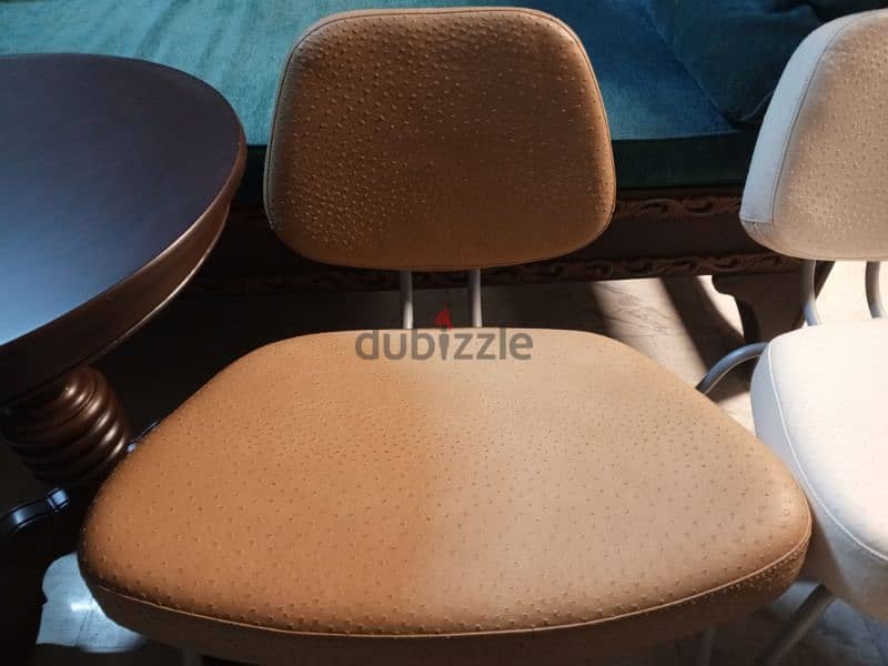 2 synthetic leather lounge chairs 3