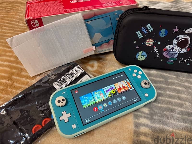 Nintendo switch lite bundle like new 5