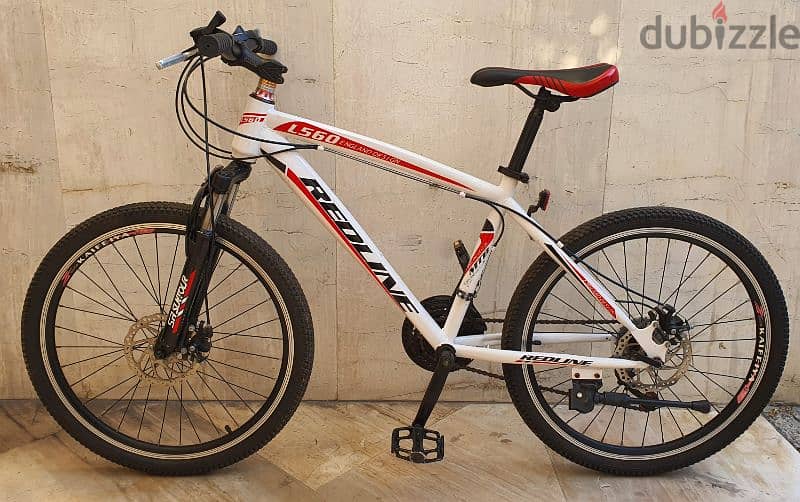 Redline size 24" disc brakes 3x7 speed 1