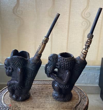 African smoking pipes statues