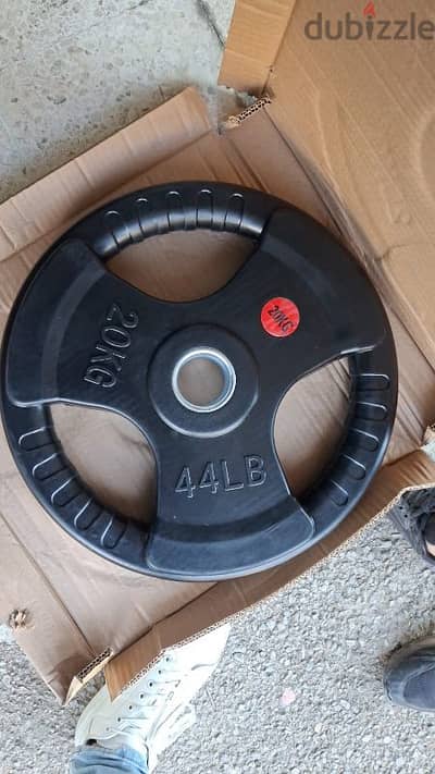 new weight plates in box