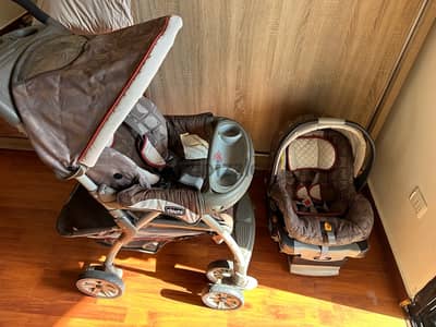 A car seat and a stroller in good condition