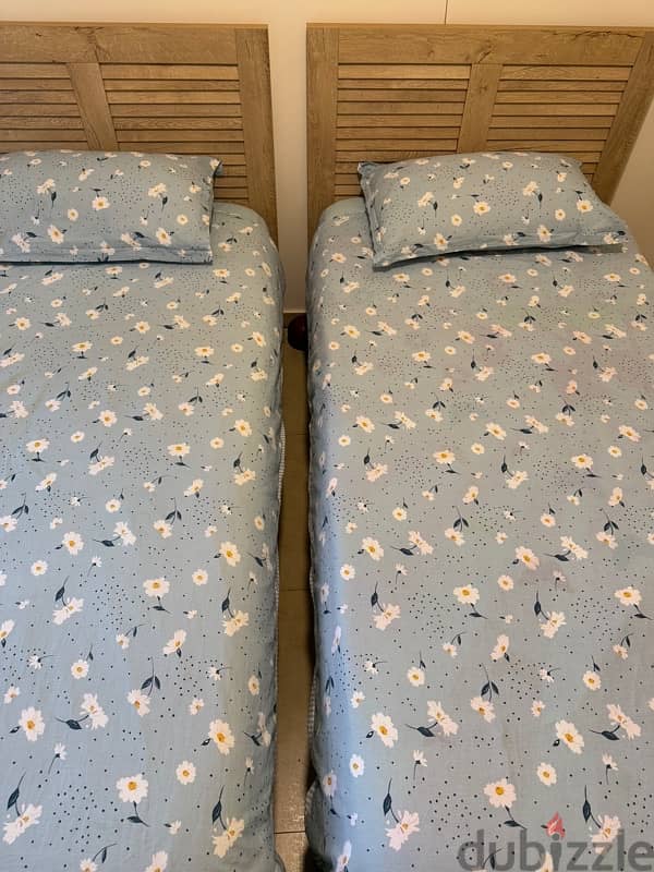 2 beds used like new ones with 2 mattress used less then 6 months 4