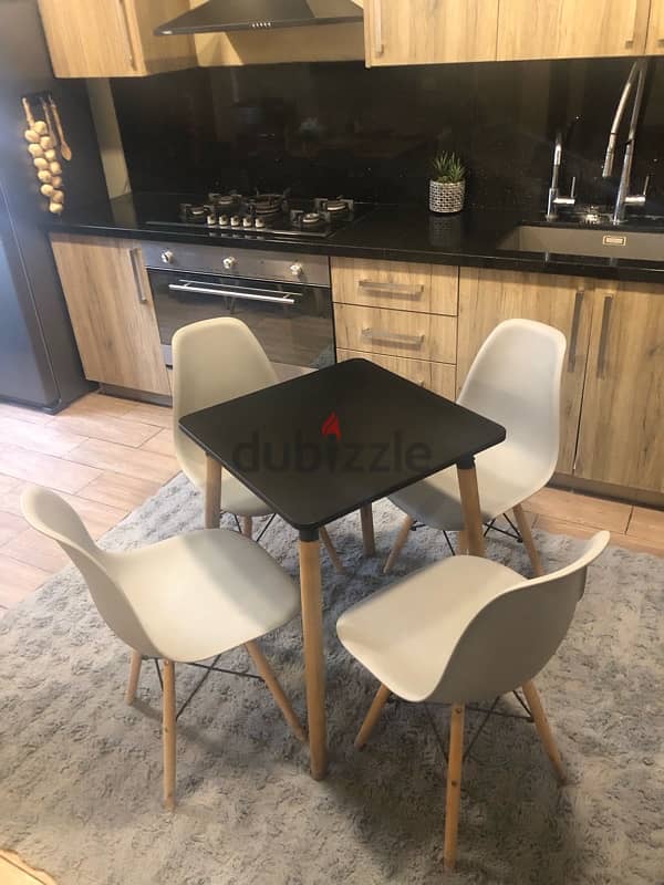 kitchen table with 4 chairs in excellent condition. 130$ 4