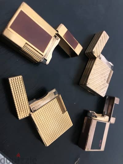 4 dupont lighters very good condition