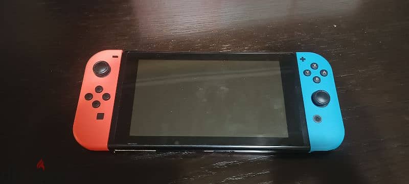 Lightly used Nintendo switch + 1 game 3