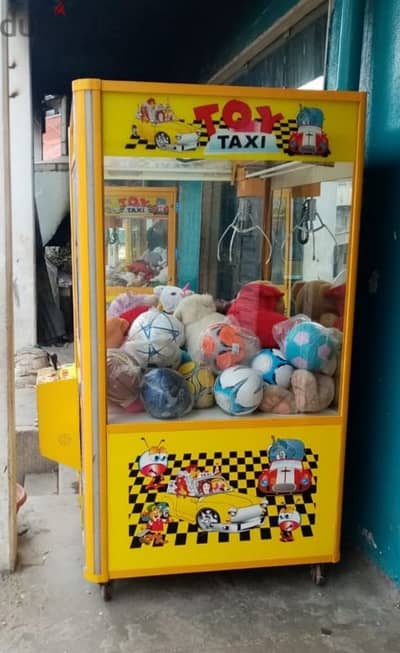 claw Machine toy taxi لعبة المخلب كماشة