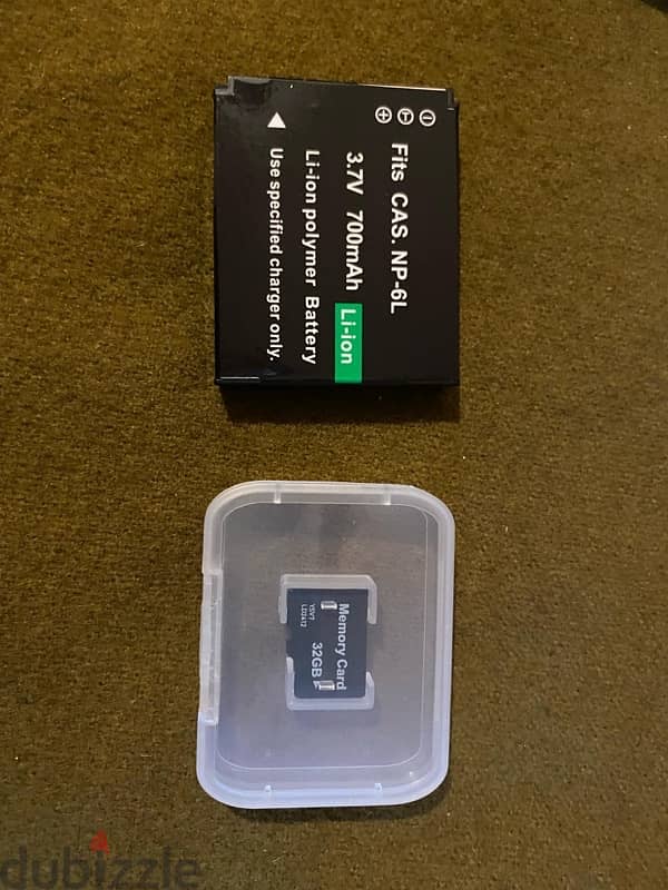 camera open box with whole set (charger, battery, 32gb memory card) 1