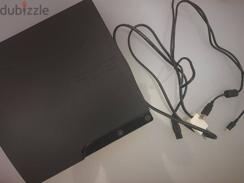 PS3 slim used with 6 games on it+controller 0