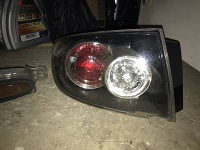 mazda 3 taillight left used original