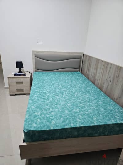 Single Bedroom with Night Table and Mattress