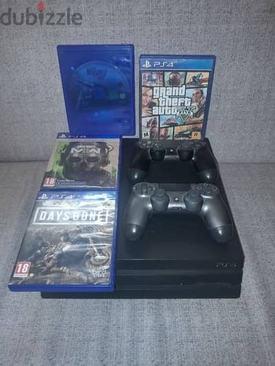 ps4 pro with 2 controllers,headset and games