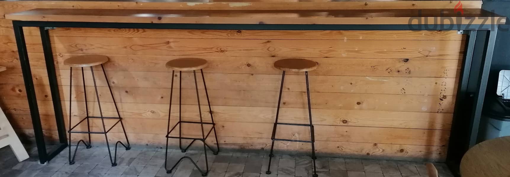 Brown wooden stool on Black metal base 0