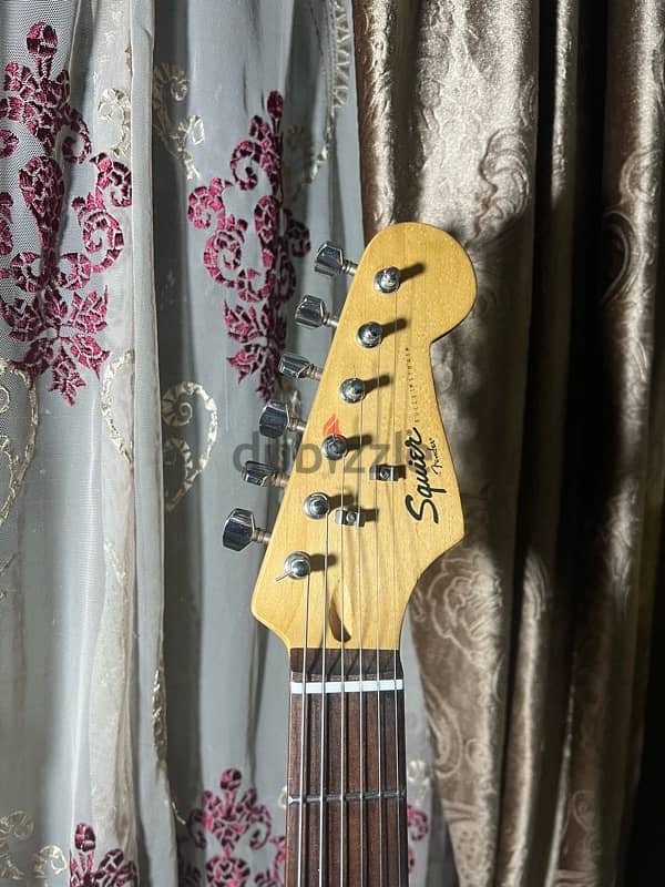 Squier by fender electric guitar 1