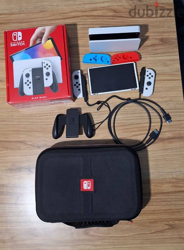 Nintendo switch oled used available with all its items starting 210$!! 0