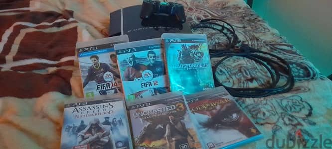 PS3, With a controller and 6 games. Barely Used.