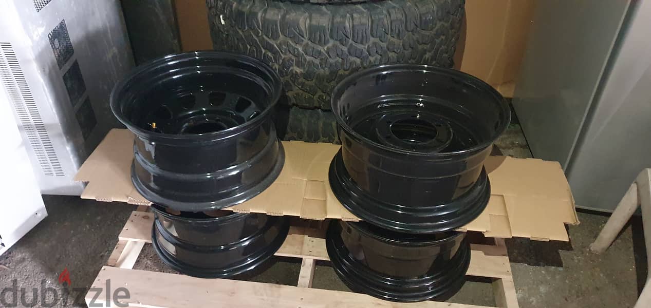 Brand New Rims 15"  15"x8" with used tires 33x10.5x15 1