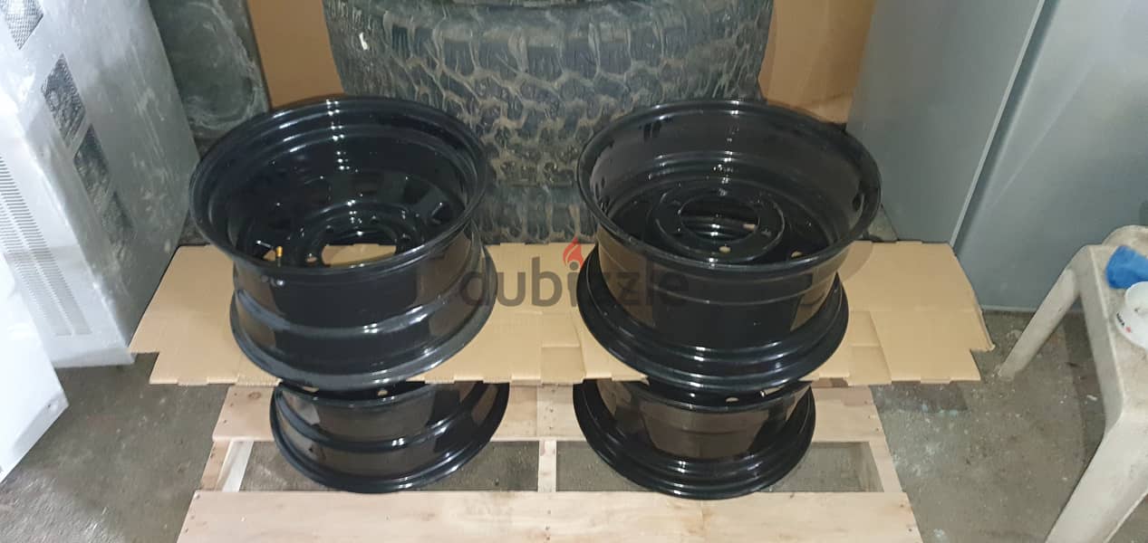 Brand New Rims 15"  15"x8" with used tires 33x10.5x15 3