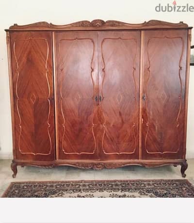 Vintage Regency armoire for clothes.